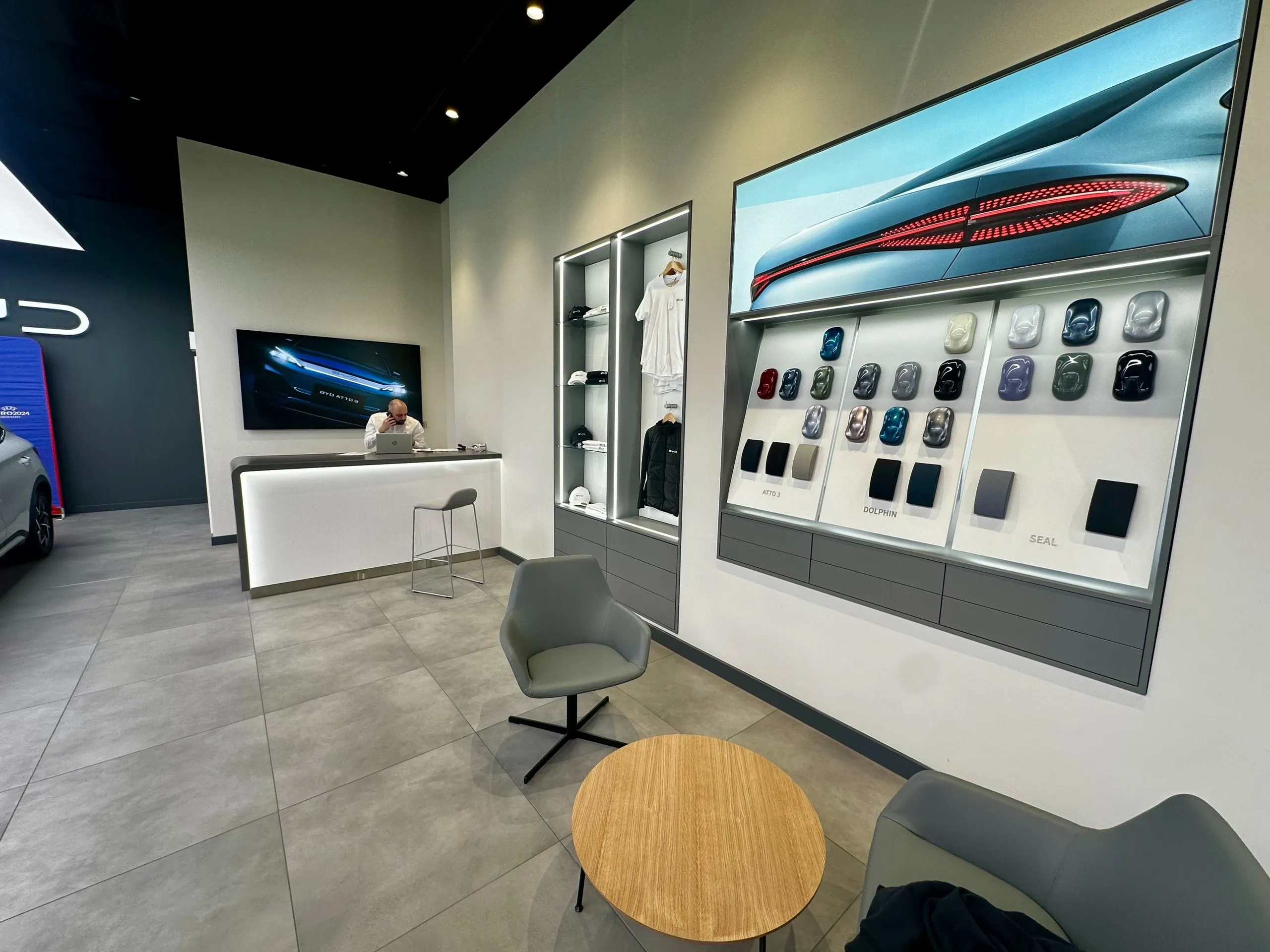 BYD showroom reception with a colour and trim sample wall
