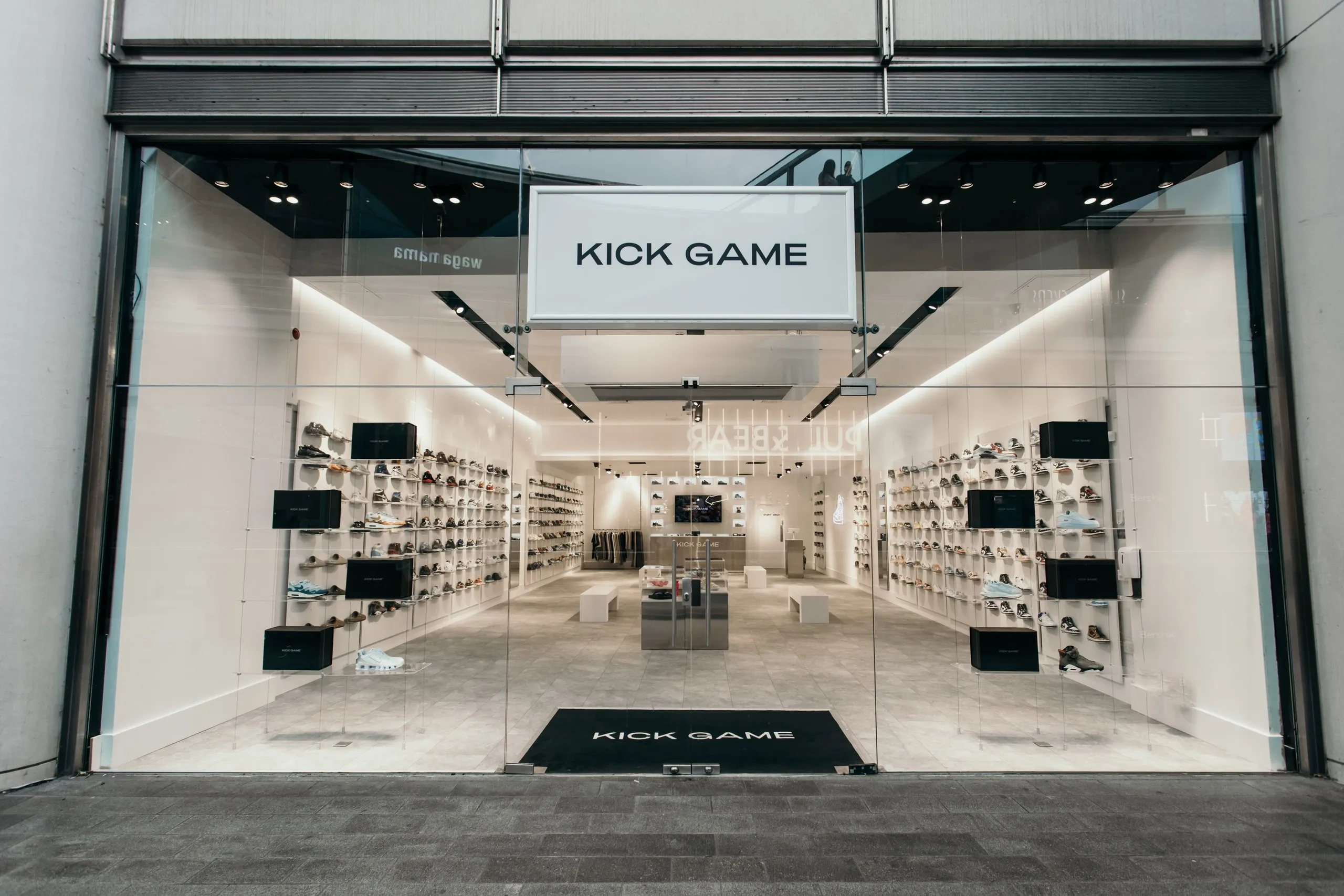 Kick Game shopfront with a hanging sign and a glazed frontage