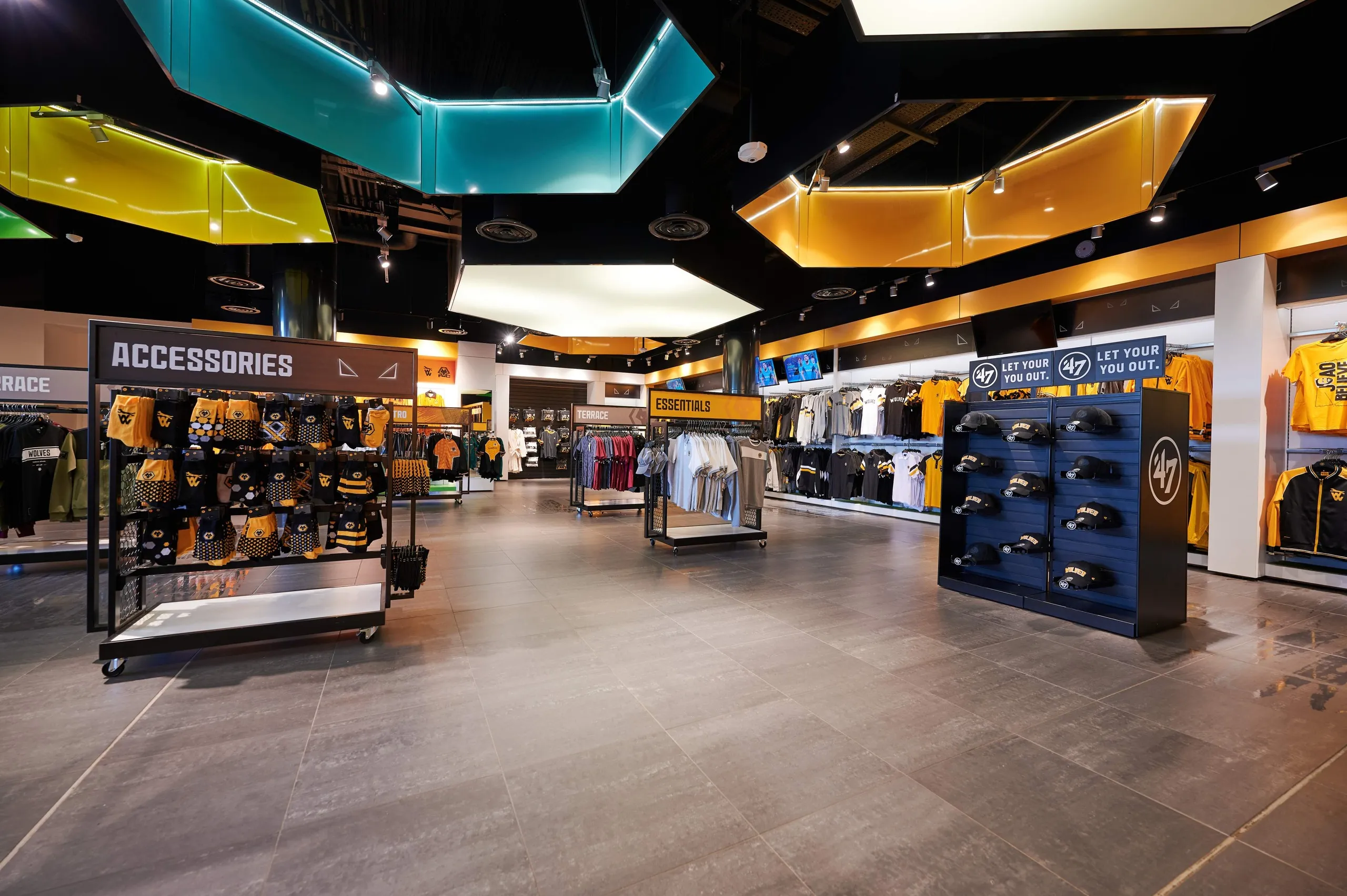 Wolves megastore with hexagonal coloured ceiling rafts and merchandise bays