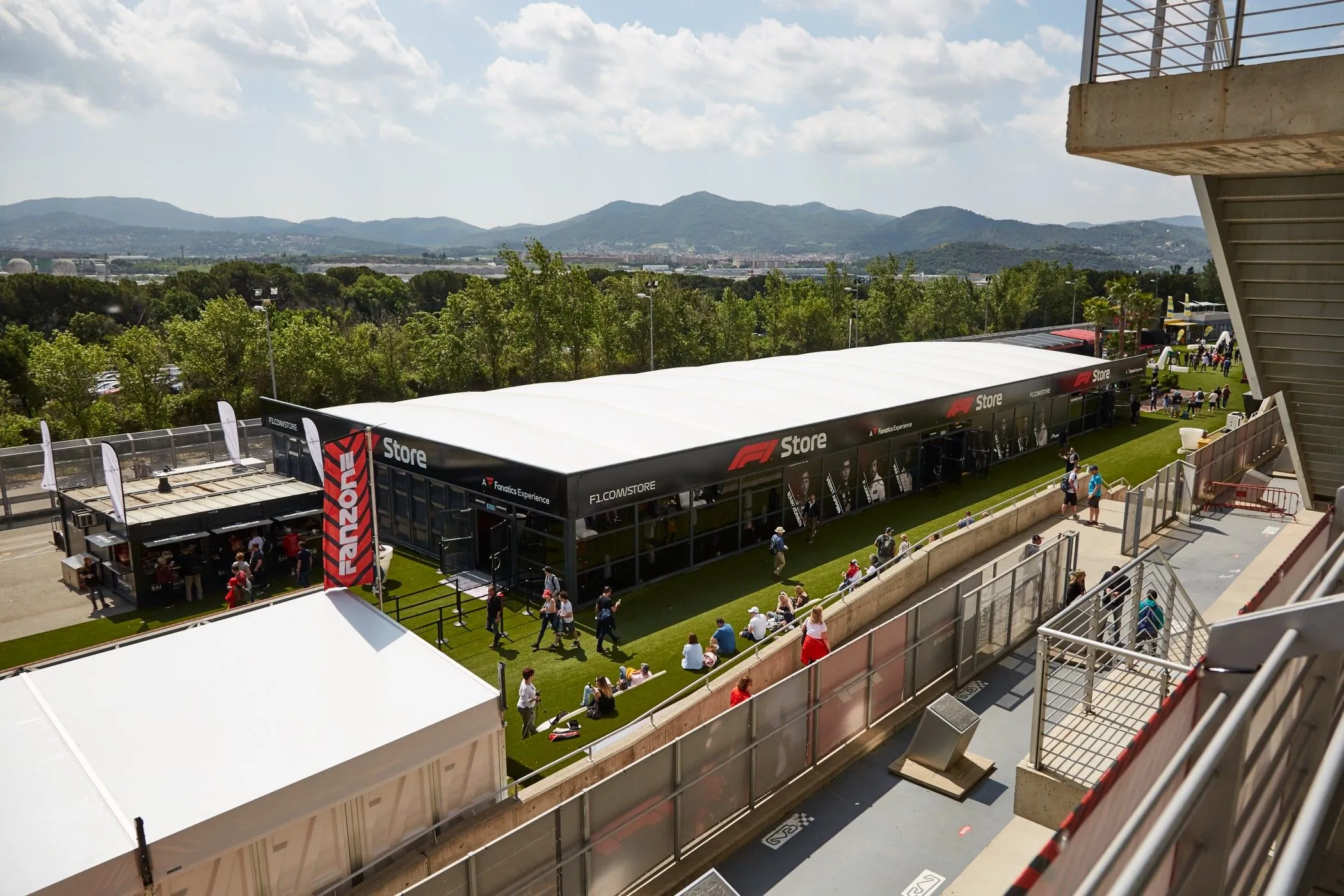 Formula 1 pop-up store marquee beside the circuit, seen from above