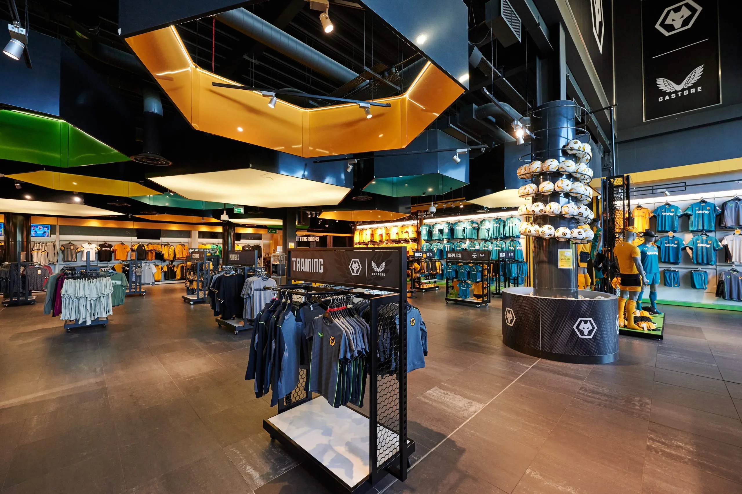 Wolves megastore with a football display column, training wear and hexagonal lighting