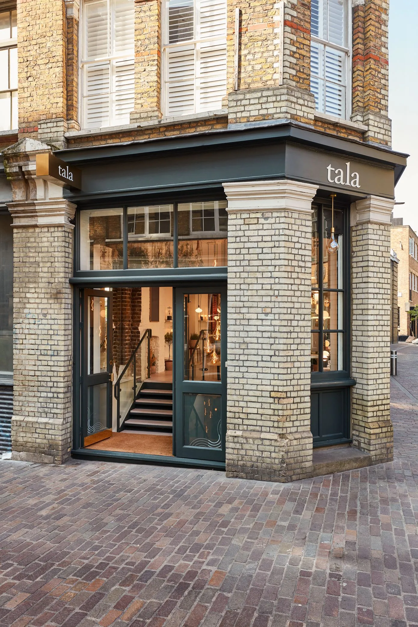 Fabergé Christmas window displays with carousels and clouds in arched cases